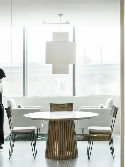 In the Penguin India office, we created serene, library-like zones for focused work and contemplation. Surrounded by books and bathed in soft, natural light, these spaces provide a quiet retreat within the larger, more collaborative office environment.