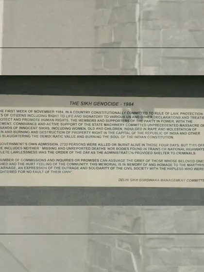 An informational plaque at the memorial detailing the events of "The Sikh Genocide - 1984." The text presents a specific, community-sanctioned narrative of the violence, which is a key point of analysis in my work on public memory.