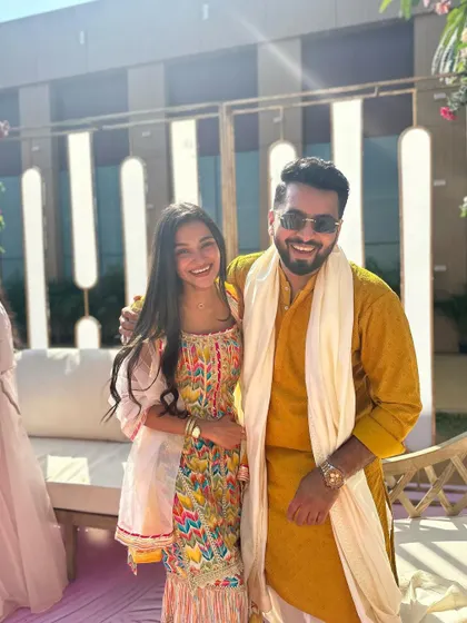 A happy photo with a guest at a daytime wedding function. I make sure to connect with everyone and make them feel like part of the celebration.
