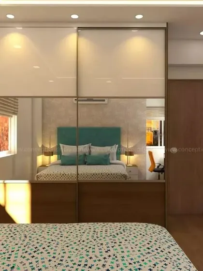 A bedroom at Candeur Carlisle with a mirrored wardrobe that makes the space feel larger and brighter.