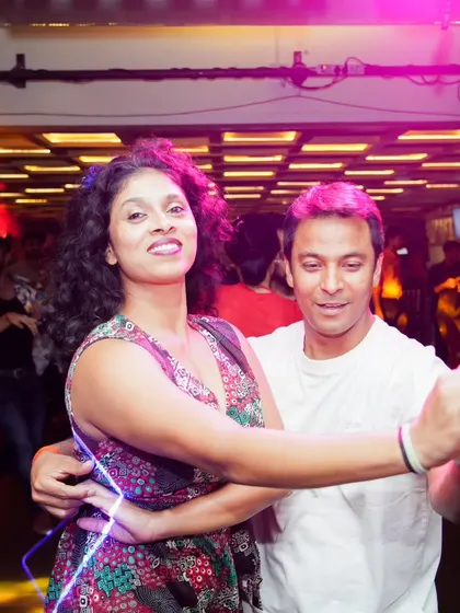 Another memory from a fun night of social dancing. The lights, the music, the people, it all comes together to create an unforgettable experience.