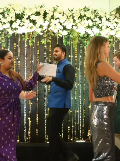 Dancing alongside guests at a cocktail party. As a dancing anchor, I don't just stay on stage; I get on the floor to share the energy and encourage everyone to let loose.