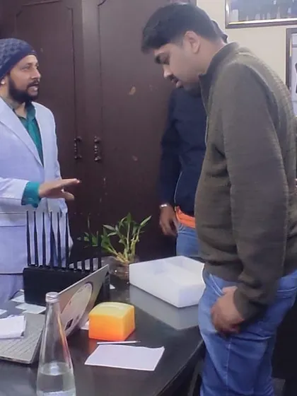 We take the time to explain how our security products work. Here, a client is getting a hands-on look at a signal jammer before making a purchase.