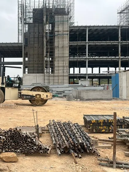 The ePositive campus construction site, showing the raw materials and heavy machinery that are part of the architectural process. It is a reminder that our designs are not just concepts, but are realized through a complex and collaborative effort.