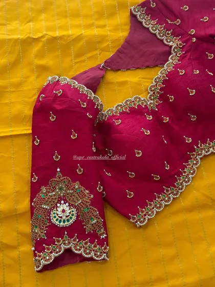 The front view of the magenta jewellery concept blouse, showing how the neckline embroidery sits perfectly.