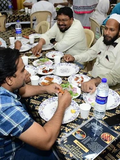 Guests engaged in conversation over a delicious meal. Our banquet is perfect for social gatherings.