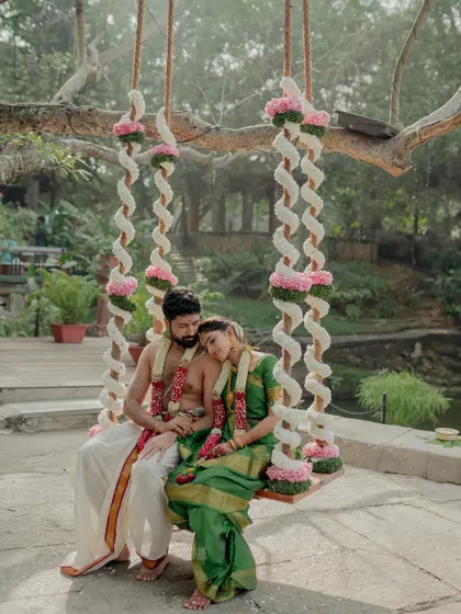 A romantic moment on the floral swing, a perfect portrait opportunity for the newlyweds.