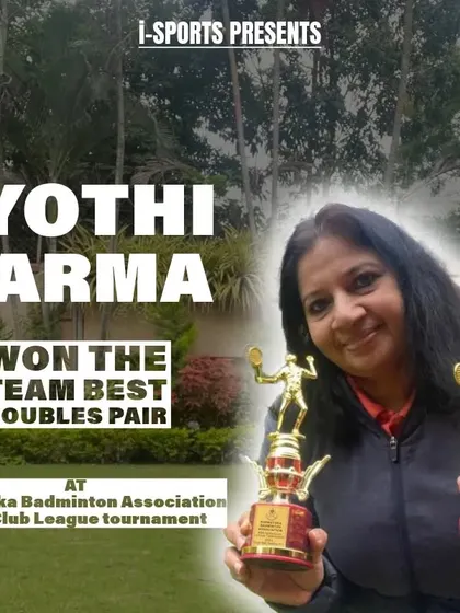 Jyothi Sarma celebrates winning both the tournament and the best doubles pair trophy at the Karnataka Badminton Association Intra Club League tournament.