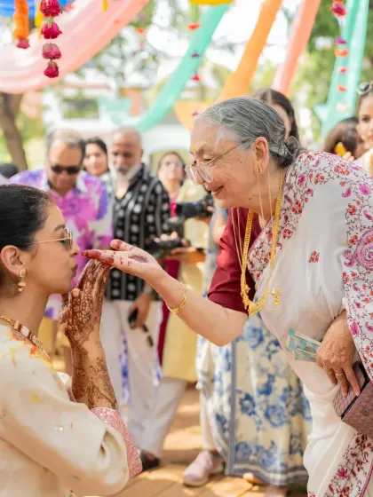 A touching moment of blessings from an elder during the Haldi. These traditional moments are the heart and soul of an Indian wedding.