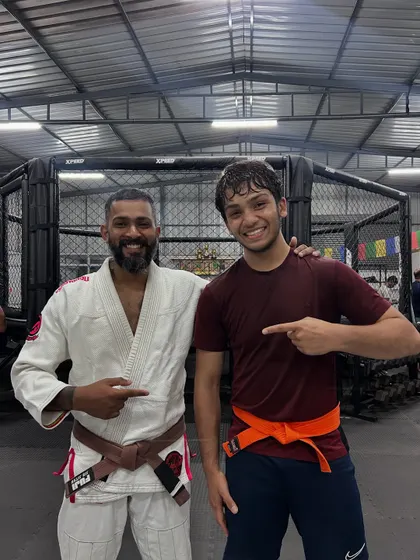 Progress is everything. We celebrate every step of the journey, like Almeer earning his orange belt here. At Reign MMA, your hard work on the mats is recognized and rewarded as you move up the ranks.