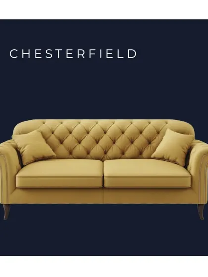 A Chesterfield sofa, with its iconic deep button-tufting and rolled arms, is a timeless piece that adds a touch of classic sophistication to any living room.