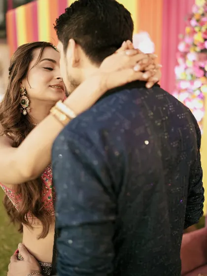 A loving glance and a tender moment between the couple during their Sangeet festivities.