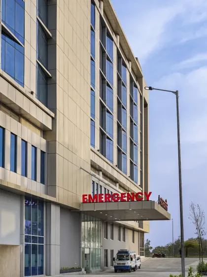 The fenestration design at Paras Yash Kothari Hospital is crucial for sustainability. Insulated glass units on the south and west facades minimize heat gain while maximizing natural daylight, reducing energy consumption and ensuring patient comfort.