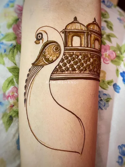 A video showing the initial outline work for another peacock arm band. This is where the foundation for a beautiful design is laid.