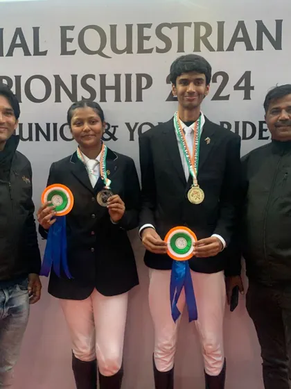 Two of our champion riders showcasing their medals from the JNEC 2024. Their success in show jumping is a testament to their skill and our training program.