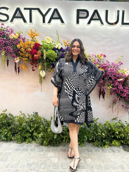 Wearing a monochrome printed kaftan from Satya Paul for their new store launch at The Dhan Mill. It's a chic, resort wear look that perfectly captures the brand's iconic design aesthetic.
