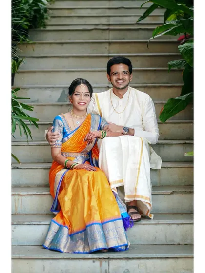 A relaxed portrait on the steps. This composition feels both elegant and informal, capturing the couple's personalities beautifully.