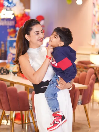 A mother's joy watching her son celebrate his third birthday. We take pride in creating seamless events that allow parents to be fully present for these special milestones.