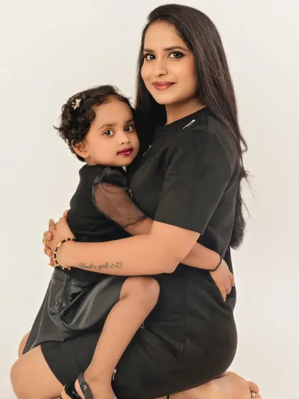 A warm and loving hug between a mother and her daughter. This studio portrait is simple, intimate, and perfectly captures their unbreakable bond.