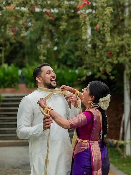 A playful moment between the couple. Our goal is to create a relaxed environment where you can have fun, resulting in genuine and joyful wedding photos.