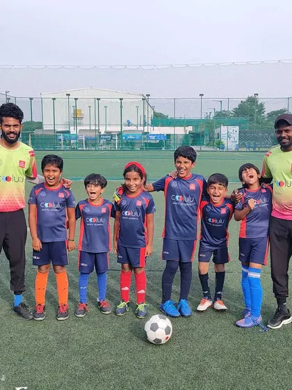 Another group of our U-7 and U-9 players, full of energy and excitement, posing with their coaches during our internal league event.