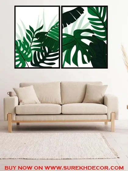 A vibrant set of two framed prints featuring lush, green fern and monstera leaves. This botanical art brings a fresh, tropical feel to any room and is perfect for plant lovers.