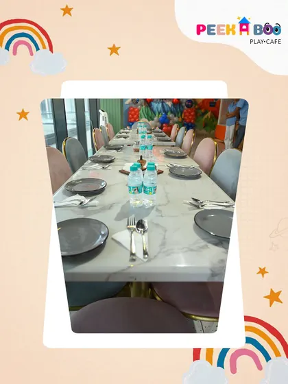 The calm before the party storm. A beautifully set dining table for adult guests at a birthday celebration.