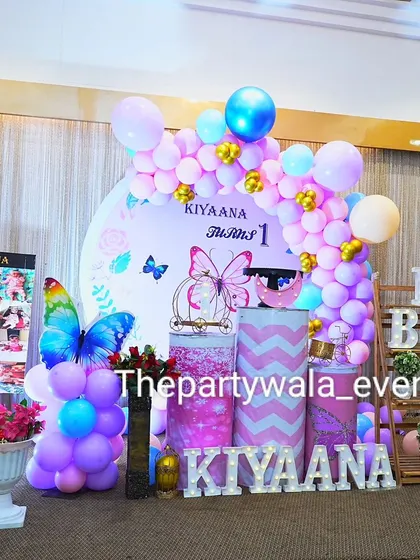 Another view of Kiyaana's butterfly party, showing the full stage and decor.