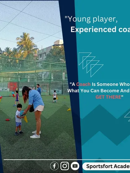 A coach is someone who can see what you can become and help you get there. Here, one of our experienced coaches guides our youngest players.