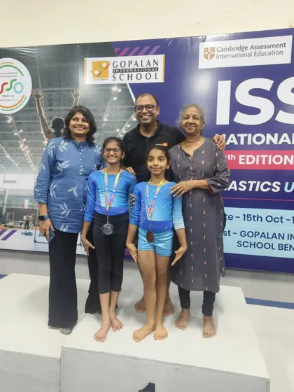 The support system behind every champion. Our gymnasts celebrating their national achievements with family and coaches.