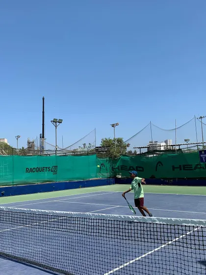 A glimpse of the competitive action from across the net during one of our junior tournament matches.