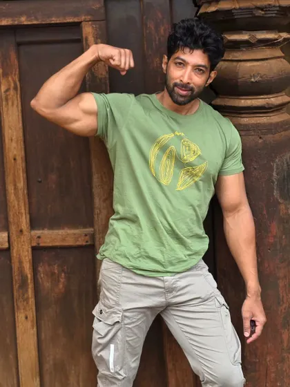 A simple bicep flex. You don't always need to be in the gym to appreciate the hard work you've put in.