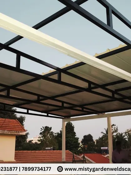 The completed puff sheet pergola at a villa in Whitefield. The insulated roof provides excellent protection from the sun, creating a cool and comfortable outdoor living area.