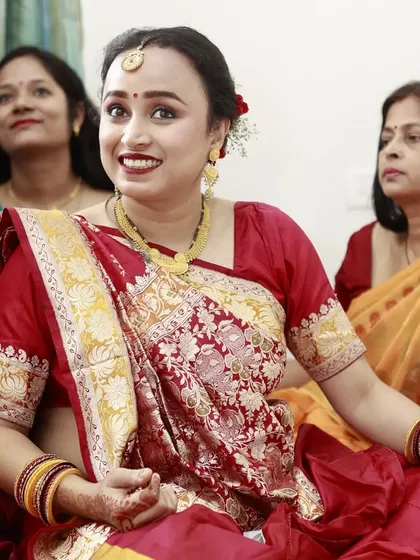 A candid moment from a baby shower celebration. I created a fresh and radiant makeup look with a classic red lip that enhanced her natural glow, perfect for this joyous occasion.