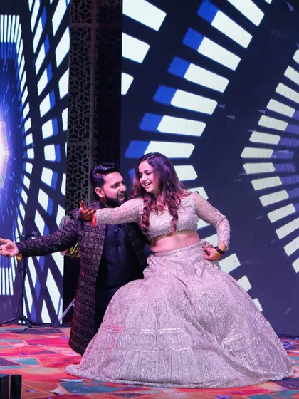 This couple met at a party and promised to party together forever. Their sangeet dance was a reflection of that promise, full of energy and fun.