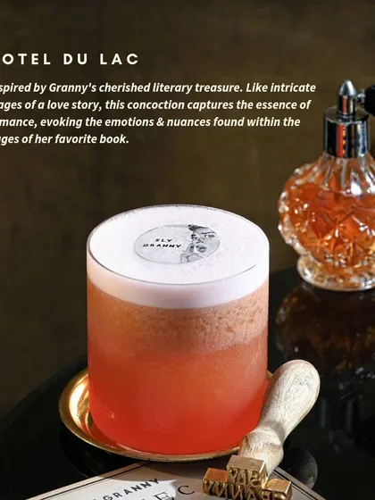 Inspired by my favorite book, the Hotel Du Lac captures the essence of a love story. It's a layered, romantic drink with a foamy top, branded with my seal of approval.
