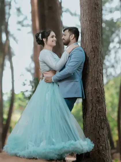 This is the same light blue two piece gown as seen in other photos, showing its versatility for different romantic poses.