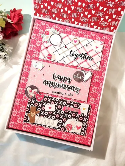 Another look at the anniversary scrapbook box, with its layered and personalized cover.