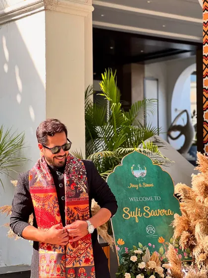 A candid moment at the 'Sufi Savera' event. The elegant, traditional attire and the serene backdrop perfectly capture the soulful and sophisticated vibe of the morning.