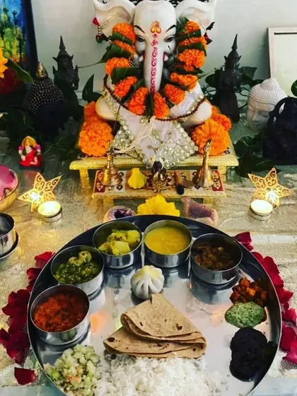 A 'Nevadya' thali offered to Ganpati Bappa, featuring a beautiful arrangement of homemade Maharashtrian delicacies. We love seeing how our customers use our Pangat to celebrate festivals with devotion and tradition.