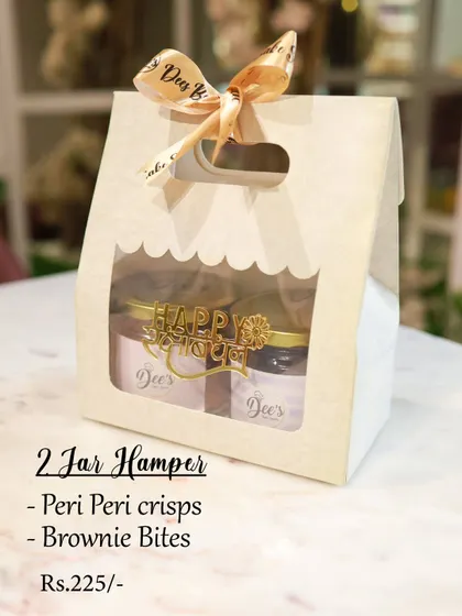 Our 2 Jar Hamper is a great small gift option. This cute window box includes two of our popular snacks: spicy peri peri crisps and fudgy brownie bites.