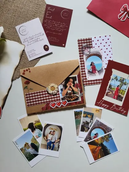 Little hampers like this can make your special one's day. This set includes a mini flap book, polaroids, and other small, personalized items.
