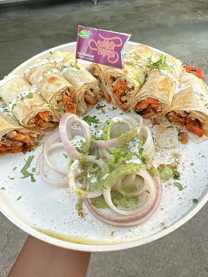 A full platter of our famous Chaap Rolls. These are perfect for a party or a satisfying snack, filled with spicy tandoori chaap and sauces.