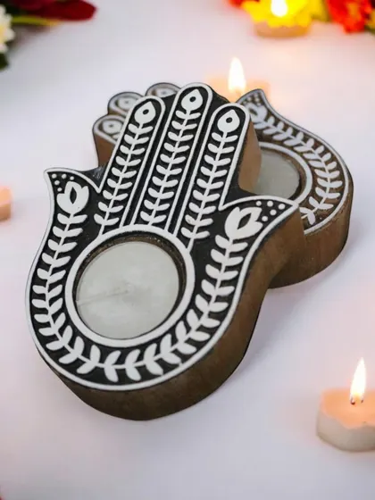 Ward off the evil eye this Diwali with a unique Hamsa-hand wooden tea-light holder. It's a thoughtful and symbolic piece of decor to add to any festive hamper.