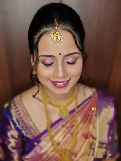 A beautiful, simple look for a traditional event. This style, with its soft purple eyeshadow and defined features, is something you can learn to do for any festive occasion.