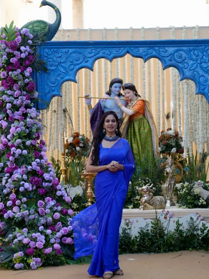 A full-length shot showing the scale of the magnificent floral and thematic decor at the wedding.