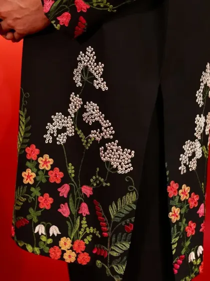 A close-up of the beautiful and colorful floral embroidery.