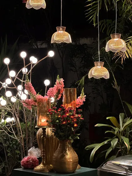 A single frame, a single moment. A close-up of a floral arrangement with unique lighting, showing our eye for detail.