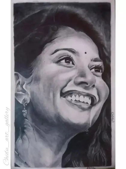 A charcoal and graphite portrait of the talented actress Sai Pallavi, also known as "Rowdy Baby". I focused on capturing the genuine joy in her wide smile.
