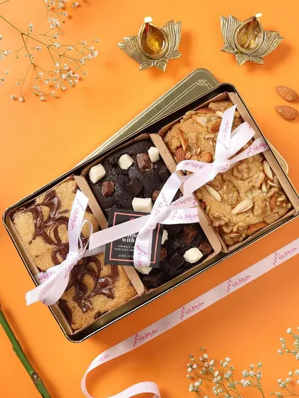 A beautiful assortment of my signature brownies, elegantly packed in a luxury tin box, ready for gifting.